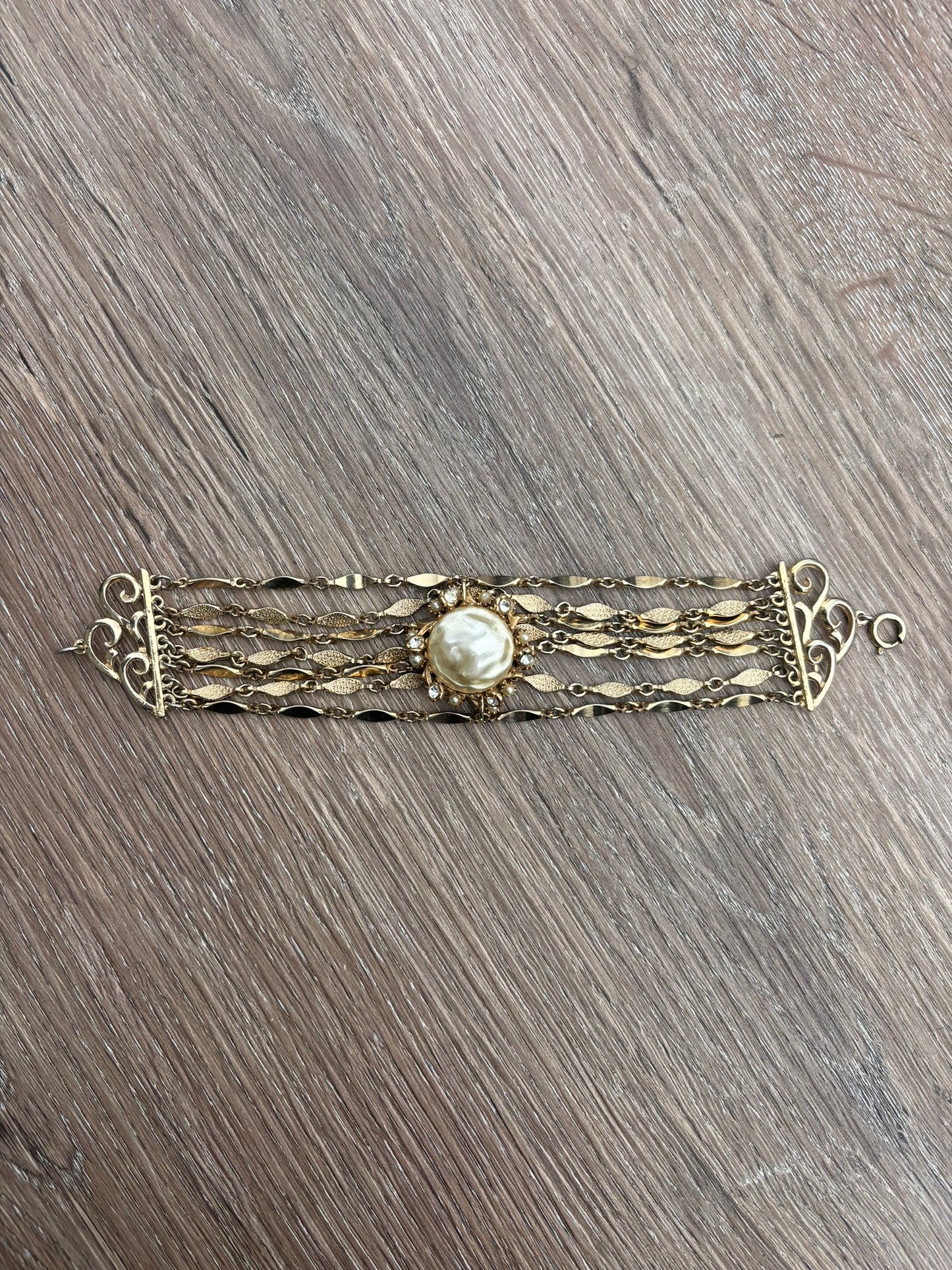 Multistrand vintage gold bracelet with brooch